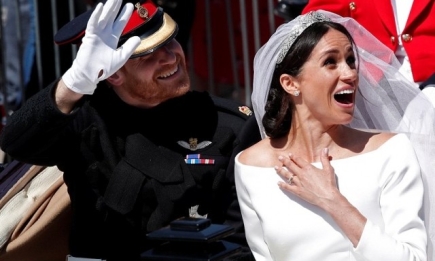 Как британцы встречали новоиспеченных супругов Меган Маркл и принца Гарри: ФОТО