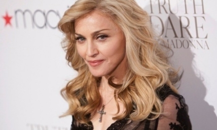 Поп-икона Мадонна закрутила роман с известным темнокожим мачо