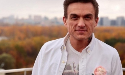 Фото дня: Влад Топалов держит на руках крохотного сына
