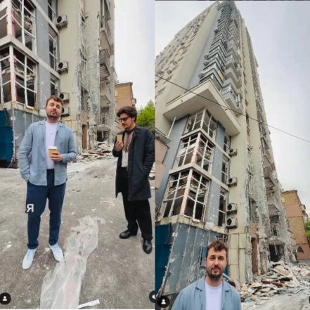 Женя Янович на тлі пошкодженого будинку. Фото: instagram.com/yanovychzhenya