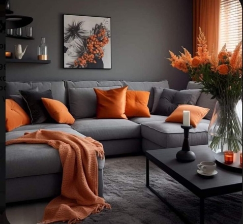 Серый диван с оранжевыми подушками, фото