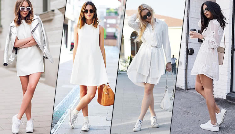 На фото жінки у сукні та білих кросівках