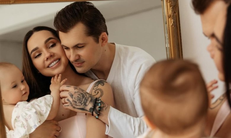 Євген Кот з дружиною і донькою на сімейній фотосесії