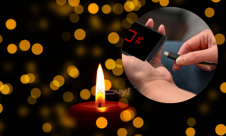 На фото зарядка телефона и свеча
