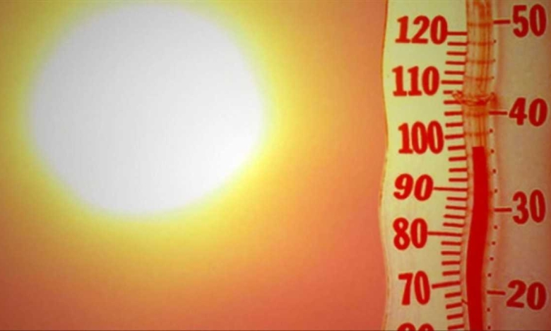 На фото термометр і сонце
