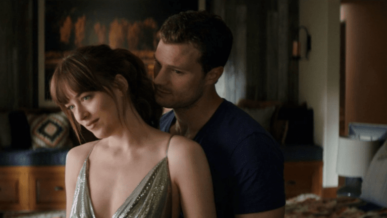 Дакота Джонсон і Джеймі Дорнан, фото